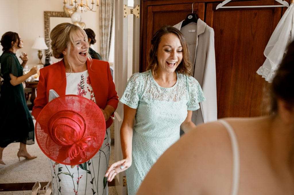 laughing during bridal preparation
