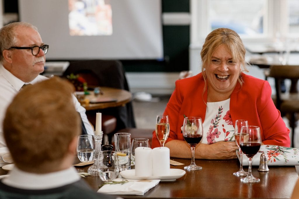 mother of the bride laughing